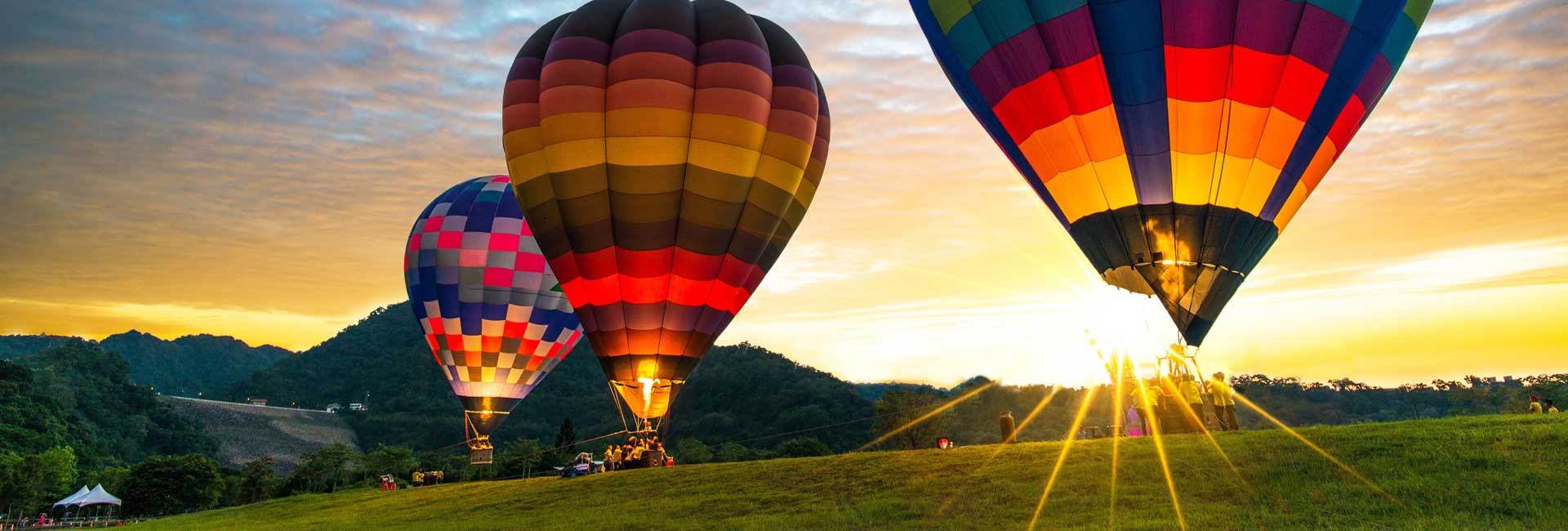 Hot air balloons floating across Washington State landscape