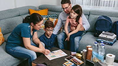 A family reviews their emergency plan