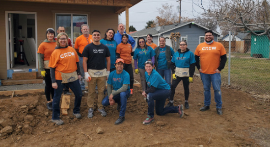 thumbnailfor Solarity employees volunteering with Habitat for Humanity