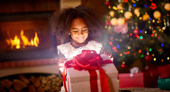 child opening gift