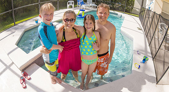thumbnailfor Family enjoying backyard pool at home