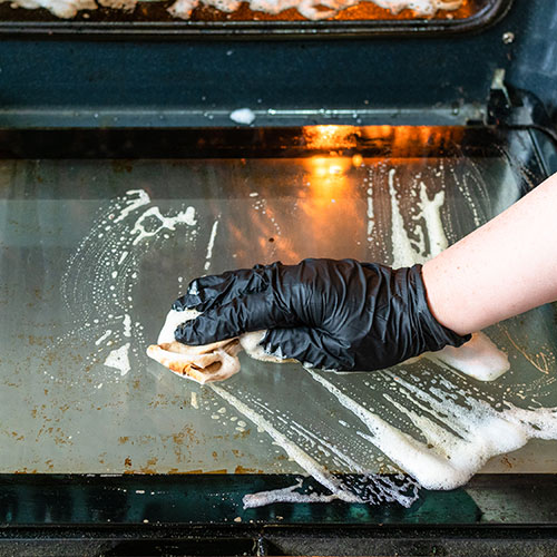 cleaning oven door