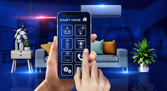 A person is using a cell phone to monitor and control smart devices in their home
