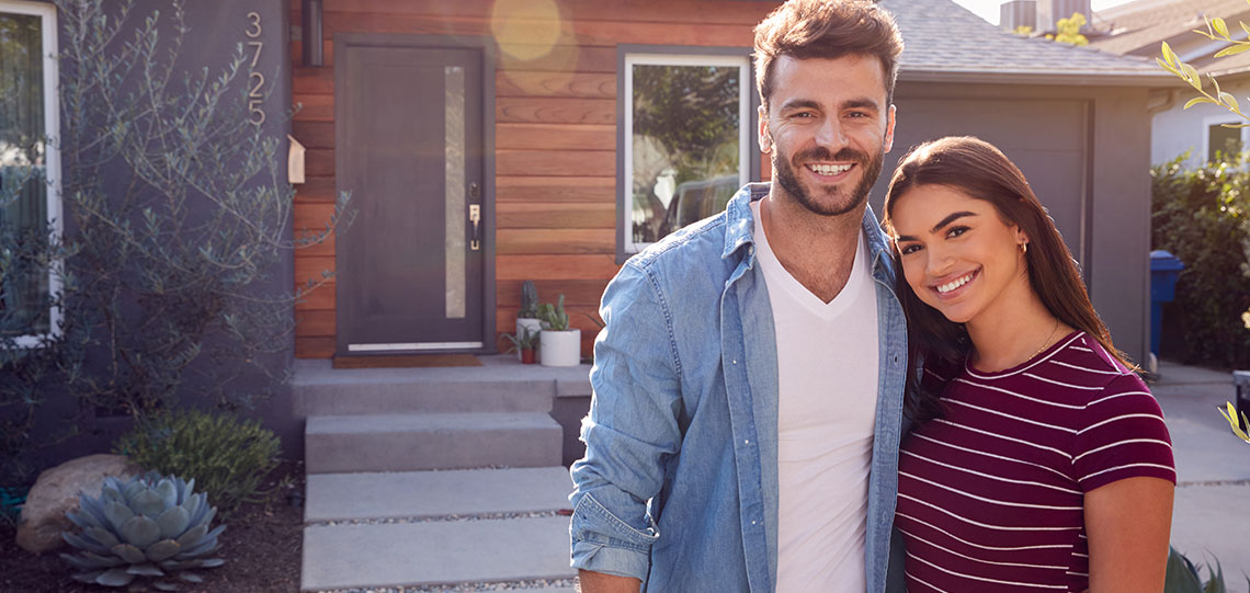 Young couple shops home loans with no down payment