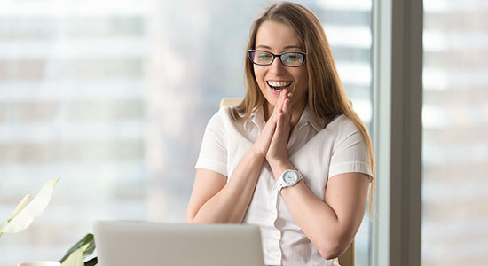 thumbnailfor Young woman checking credit score on laptop